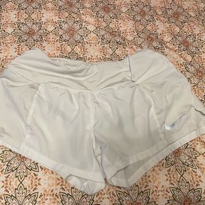 White nike running shorts